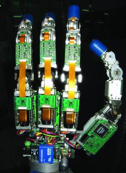 科技时代_组图：新一代机器人四指灵巧手在哈尔滨问世
